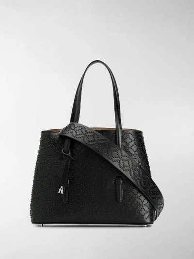 Shop Alaïa Small Studded Tote Bag In Black