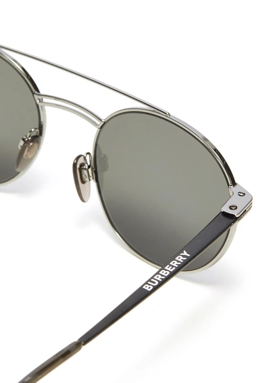 Shop Burberry Double Bridge Metal Round Sunglasses In Black
