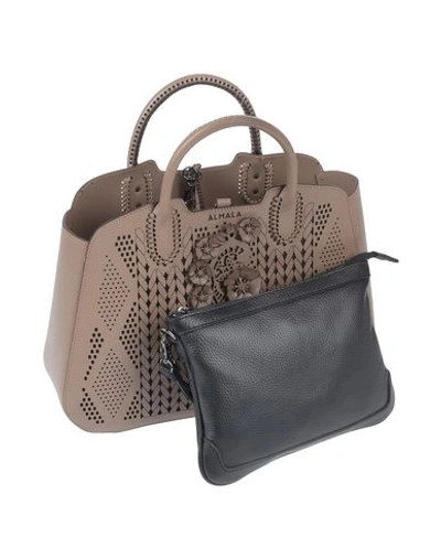 Shop Almala Handbag In Light Brown