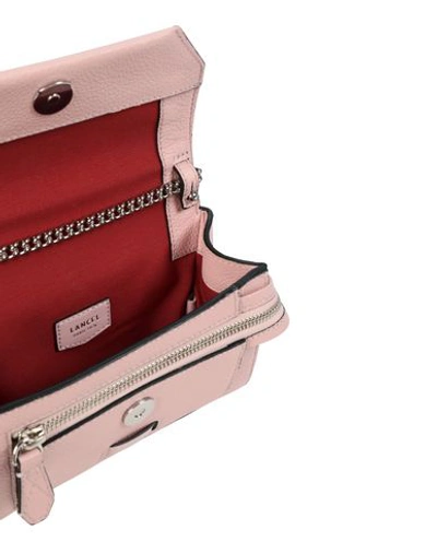 Shop Lancel Handbag In Pink