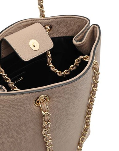 Shop Steve Madden Handbags In Camel