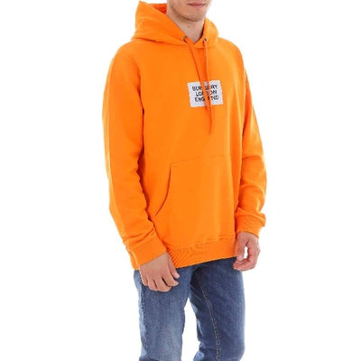 Shop Burberry Logo Print Hoodie In Orange