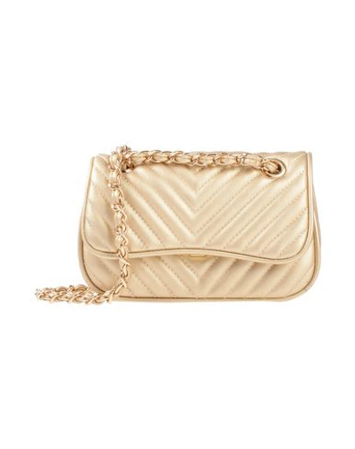 Shop Mia Bag Cross-body Bags In Gold