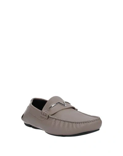 Shop Versace Loafers In Sand