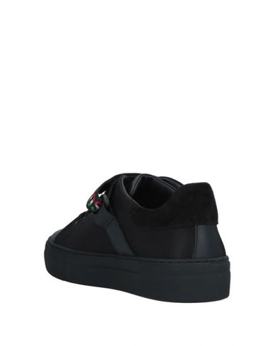 Shop Moschino Sneakers In Black