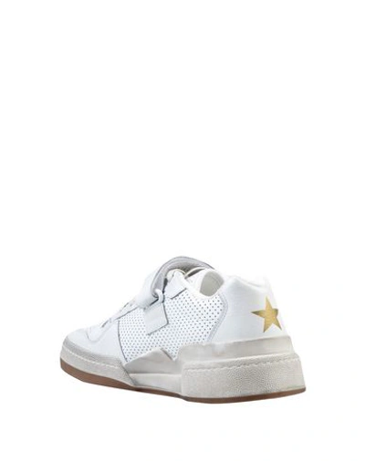 Shop Saint Laurent Sneakers In White