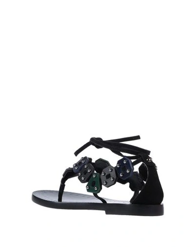 Shop Alaïa Toe Strap Sandals In Black