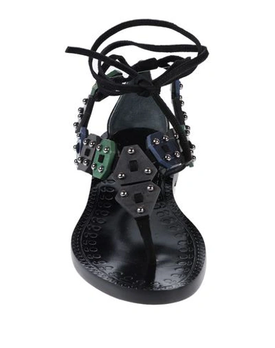 Shop Alaïa Toe Strap Sandals In Black