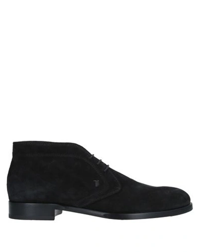 Shop Tod's Boots In Black