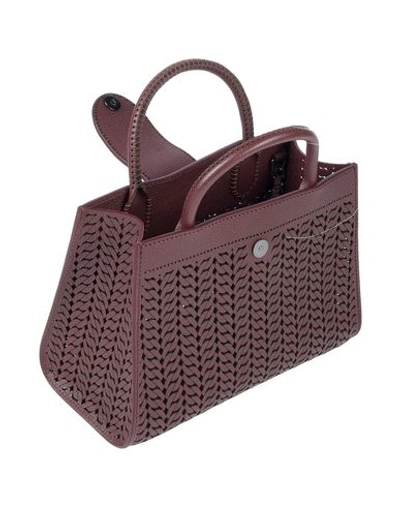 Shop Almala Handbag In Cocoa