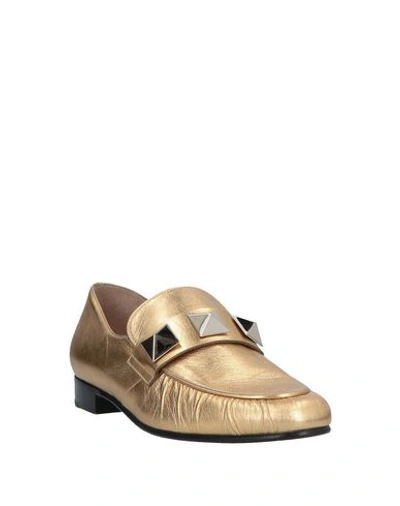 Shop Valentino Loafers In Gold