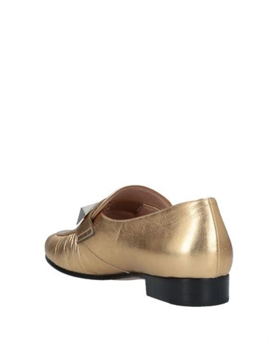 Shop Valentino Loafers In Gold