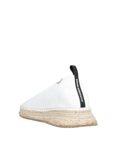 Shop Alexander Wang Sneakers In White