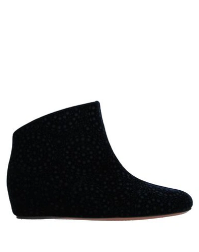 Shop Alaïa Ankle Boot In Dark Blue