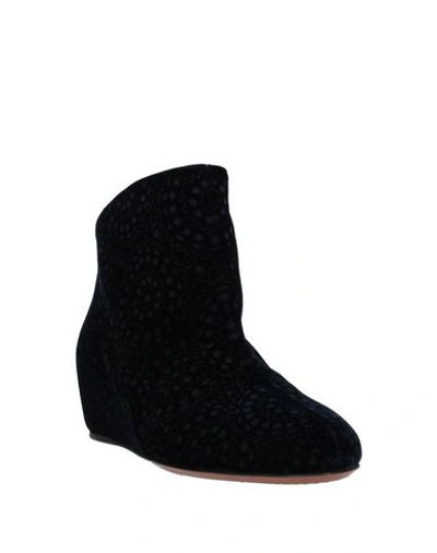 Shop Alaïa Ankle Boot In Dark Blue