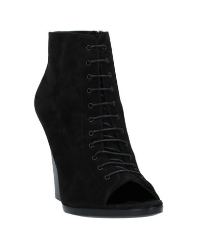 Shop Burberry Ankle Boot In Black