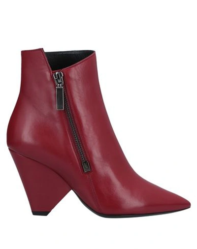 Shop Saint Laurent Ankle Boots In Red