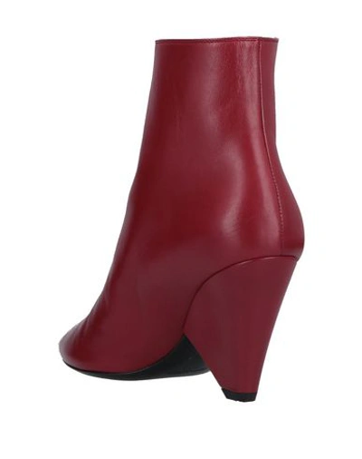 Shop Saint Laurent Ankle Boots In Red