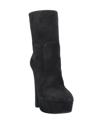 Shop Dolce & Gabbana Ankle Boot In Black