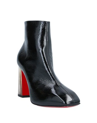 Shop Christian Louboutin Ankle Boots In Black