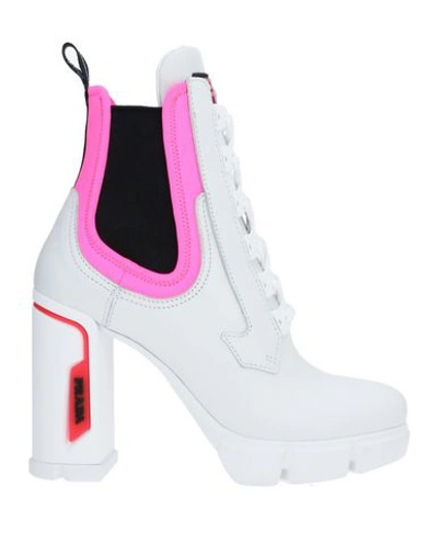 Shop Prada Ankle Boots In White