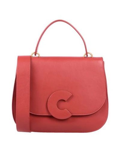 Shop Coccinelle Handbags In Brick Red