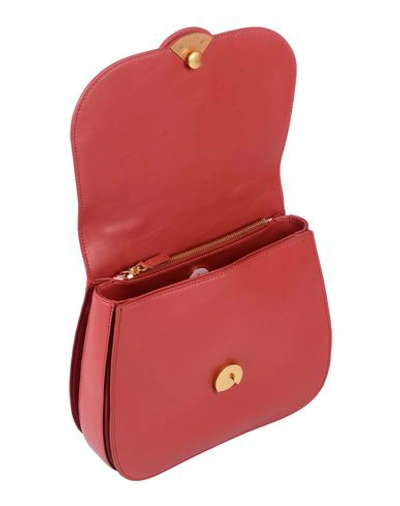 Shop Coccinelle Handbags In Brick Red