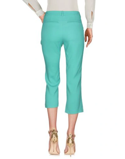Shop Pinko Cropped Pants & Culottes In Green