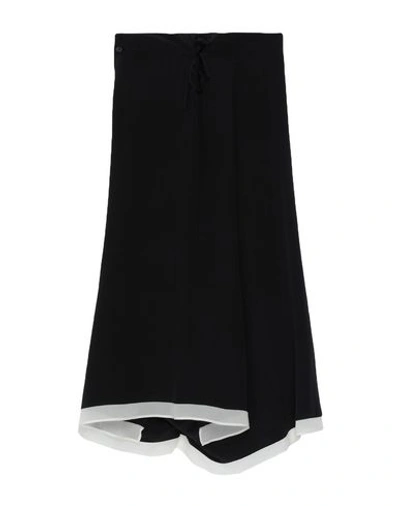 Shop Yohji Yamamoto Cropped Pants & Culottes In Black