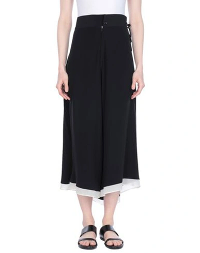 Shop Yohji Yamamoto Cropped Pants & Culottes In Black