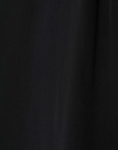 Shop Yohji Yamamoto Cropped Pants & Culottes In Black
