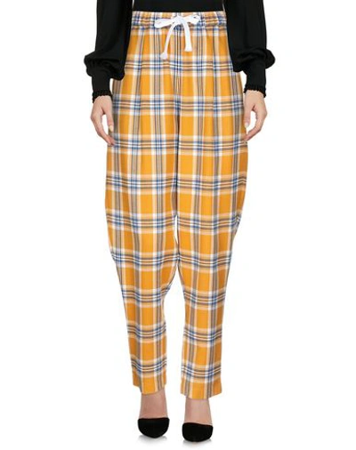 Shop Neul Casual Pants In Yellow