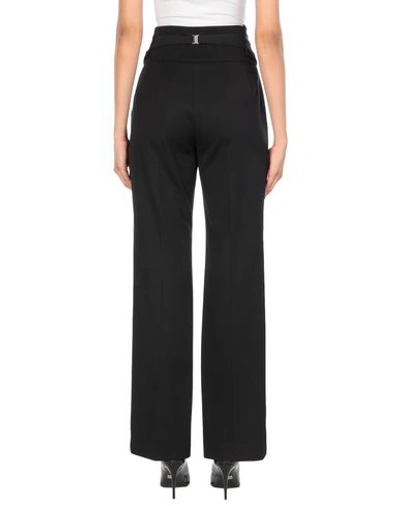 Shop Moschino Casual Pants In Black