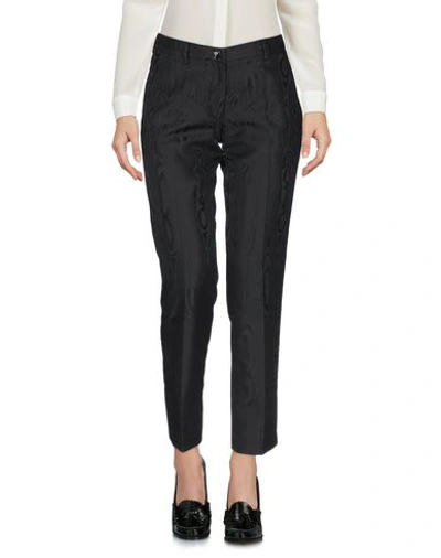 Shop Versace Cropped Pants & Culottes In Black