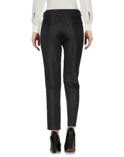 Shop Versace Cropped Pants & Culottes In Black