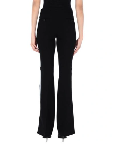 Shop Moschino Casual Pants In Black