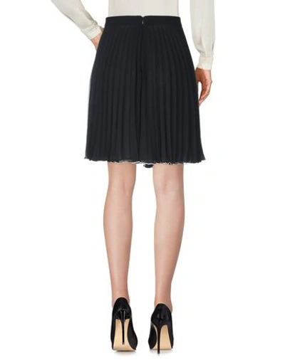 Shop Boutique Moschino Knee Length Skirts In Black