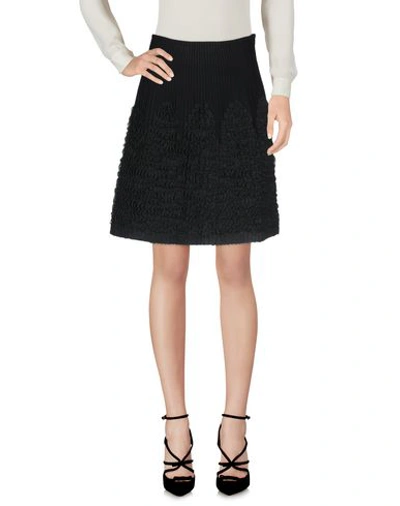 Shop Alaïa Knee Length Skirt In Black