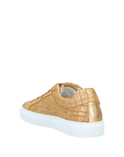 Shop Hide & Jack Sneakers In Gold