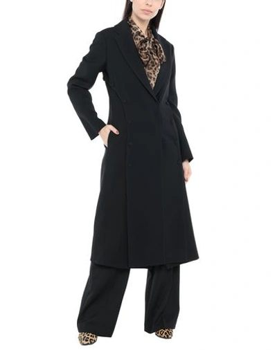Shop Roberto Cavalli Coats In Black