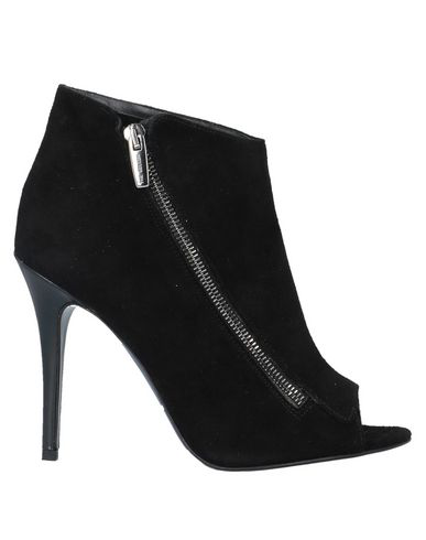 The Seller Ankle Boot In Black | ModeSens