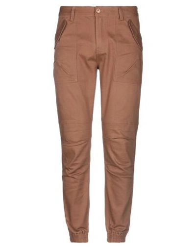 Shop Publish Casual Pants In Brown