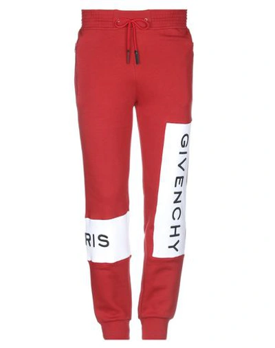 Shop Givenchy Casual Pants In Brick Red