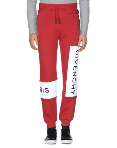 Shop Givenchy Casual Pants In Brick Red