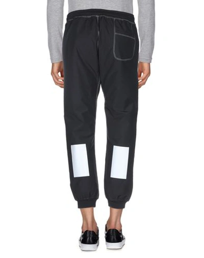 United Standard Pantaloni Pusher Pants In Black | ModeSens