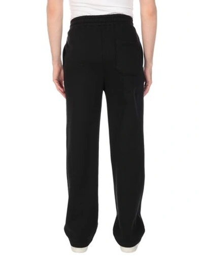 Shop Ader Error Casual Pants In Black
