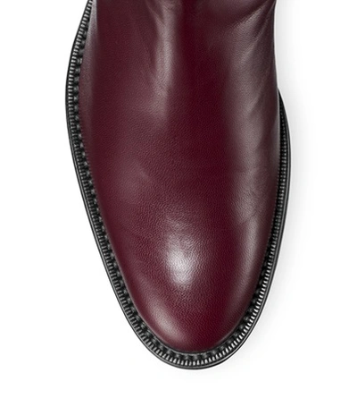 Shop Stuart Weitzman The Julia Boot In Cabernet Matte Leather