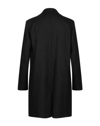 Shop Mauro Grifoni Coats In Black