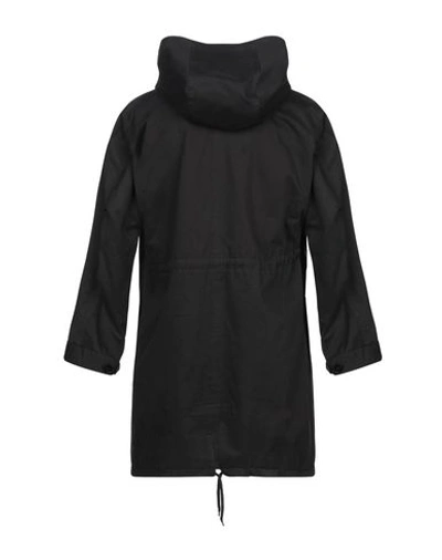 Shop Mauro Grifoni Coats In Black