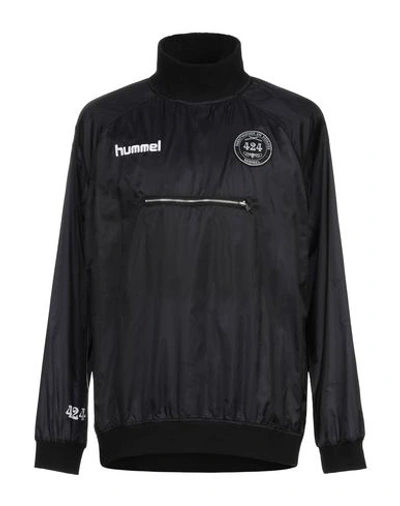 Shop Hummel Jackets In Black